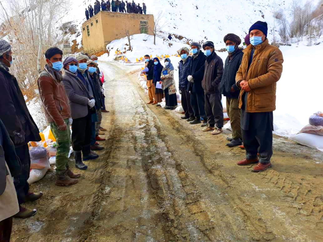 Beneficiaries are waiting in line for the Relief Package distribution process in Bamyan